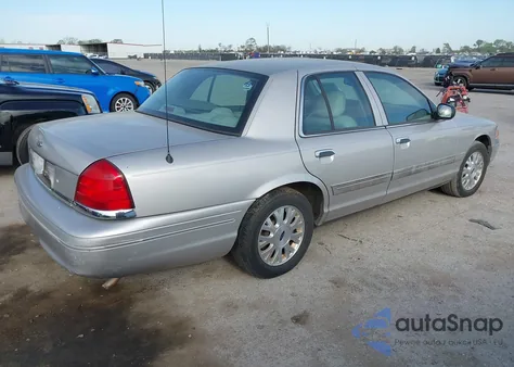 2005 Ford Crown Victoria Lx/Lx Sport z USA, uszkodzony, nr VIN 2FAFP74W35X102100